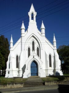 Uniting Church Australia - white towering church with many pillars