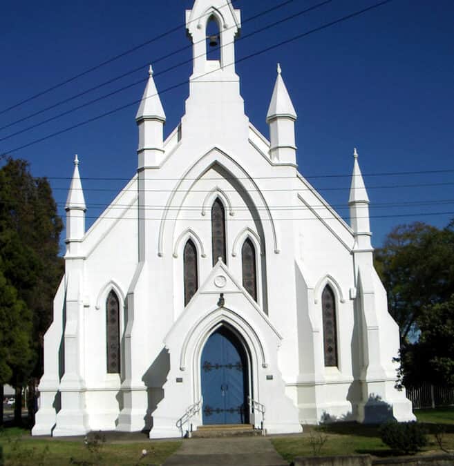 Uniting Church Australia - white towering church with many pillars